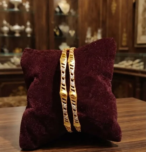 GOLD BANGLES
